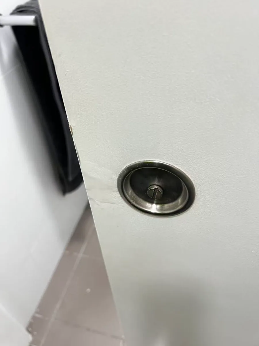 Owner-supplied close photo of sliding-door hardware