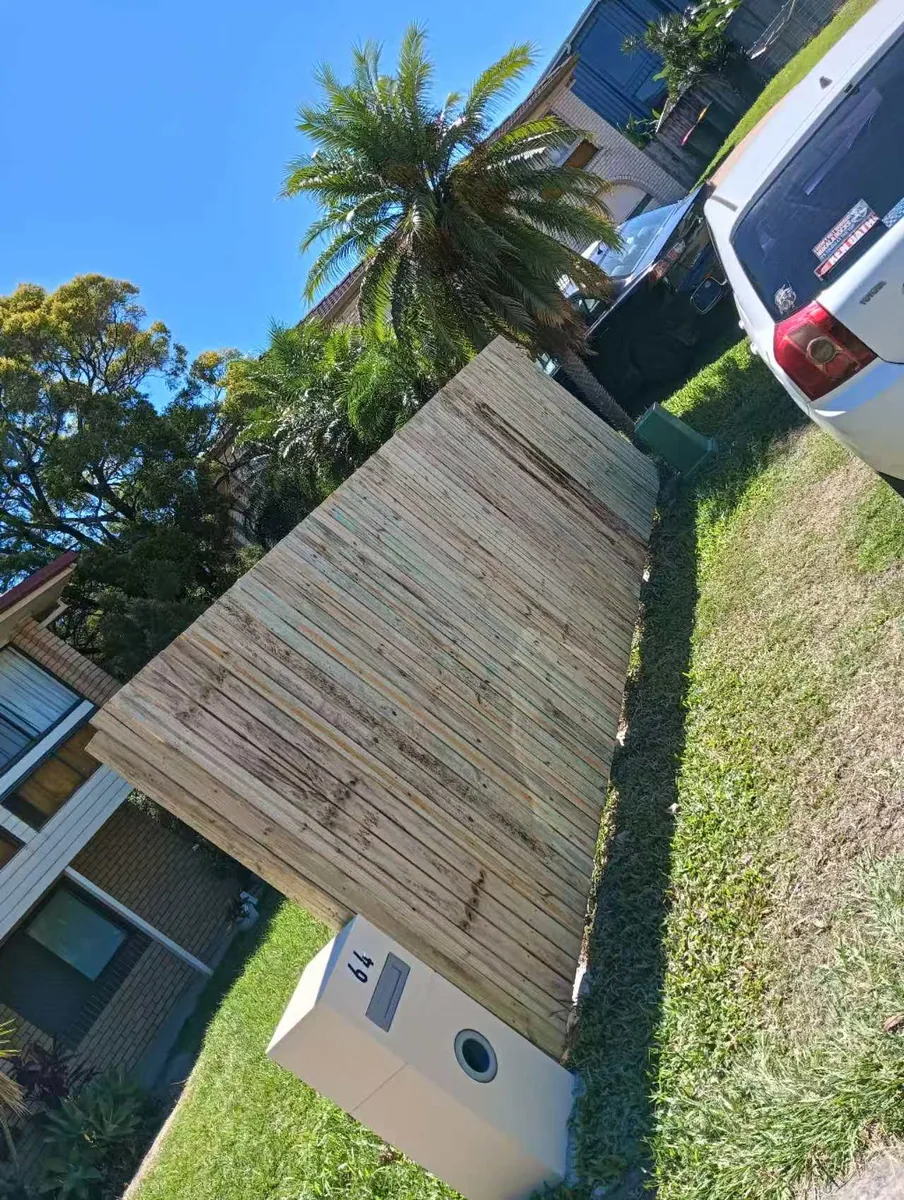 Owner-supplied photo of a completed-looking timber fence section